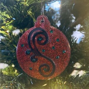 Glittery Red Holiday Ornament with green accents